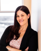 Professional headshot of Tricia Broderick